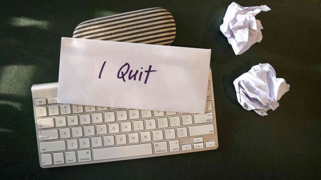 I quit note on a keyboard with crumpled paper